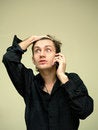 Free Man In Stressful Is Talking On Phone Stock Photo - 8237660