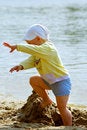 Free Baby Girl Playing On The Sea Shore Stock Photos - 838353