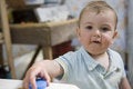 Free Very Dirty One-year-old Baby Wearing Dirty T-shirt Royalty Free Stock Images - 8351889