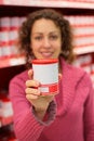 Free Young Woman Holds Jar In Store Royalty Free Stock Image - 8360396