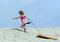 Free Child Running Up Sand Dune Stock Images - 8414914