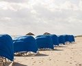 Free Blue Beach Shelters Down Beach Royalty Free Stock Photos - 8507828