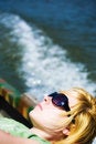 Free Woman Relaxing On Boat Stock Images - 8529124