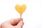 Free Hand Gives Heart-shaped Candy Isolated Stock Photos - 8541133