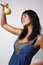 Free The Brunette With A Green Apple Royalty Free Stock Image - 8576906