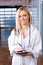 Free Woman Doctor Holding A Chart Royalty Free Stock Images - 8593509
