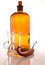 Free Bottle With Shiny Oil And A Chilly Pepper Beside. Stock Photo - 8625420