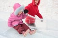 Free Girl Rolls Down On Ice Slope With Mother Stock Image - 8632181