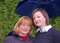 Free Mother And Adult Daughter Under Umbrella Stock Photos - 8655963