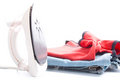 Free Electric Iron And Pile Of Clothes Stock Photo - 8712770