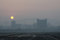 Free The Foggy City And Sunset Royalty Free Stock Photo - 8718935