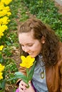 Free Pretty Girl Smelling Flower Stock Image - 8732601