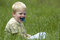 Free Little Boy In The Grass Royalty Free Stock Photography - 885497