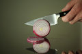 Free Onion Cut With Knife Stock Photos - 8856363