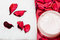 Free Cream And Towel With Red Petals Stock Image - 8890991