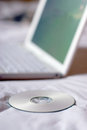 Free Cd Next To Laptop Royalty Free Stock Photography - 894747