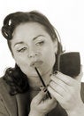 Free Woman Using Lip Color Royalty Free Stock Image - 8920836