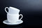 Free Two Cups Of White On A Black Stock Photo - 8961960