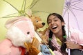 Free Girl Gives Protection To Toy Stock Photo - 8972190
