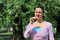 Free Young Attractive Female Smelling A Flower Royalty Free Stock Image - 9064416
