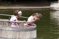 Free Twins Playing In A Barrel 01 Royalty Free Stock Photos - 920838