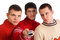 Free Three Friends With Remote Control Royalty Free Stock Photo - 9290635