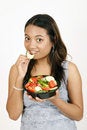 Free Girl Eating Salad Royalty Free Stock Photography - 9303197