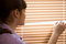 Free Teenager Girl Looks Out Of The Window Royalty Free Stock Images - 9320279