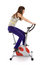 Free Teenager Doing Fitness On A Stationary Bike Stock Image - 9320301