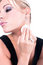 Free Beautiful Young Woman Applying Foundation Makeup Stock Image - 9349271