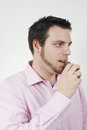 Free Young Man Eating A Chocolate Royalty Free Stock Image - 9388566