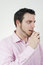 Free Young Man Eating A Chocolate Royalty Free Stock Image - 9388566