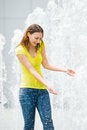 Free Young Caucasian Girl Playing At Fountain Royalty Free Stock Photo - 9409055