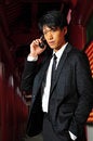 Free Asian Man With Cell Phone Royalty Free Stock Photo - 9409255