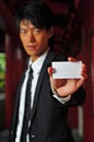 Free Asian Man Holding Card Stock Photos - 9409313