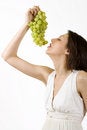 Free Woman Tasting A Grape Royalty Free Stock Photos - 9539068