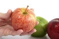 Free Apple In Hand Royalty Free Stock Photography - 970747