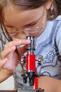 Free Girl Studying Something With Microscope Royalty Free Stock Photography - 9791767