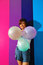 Free Young Asian Woman Holding Balloons Royalty Free Stock Photography - 9801047