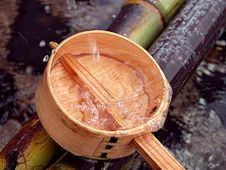 Bamboo Ladle And Splash Stock Images Bamboo Ladle And Splash Stock Images