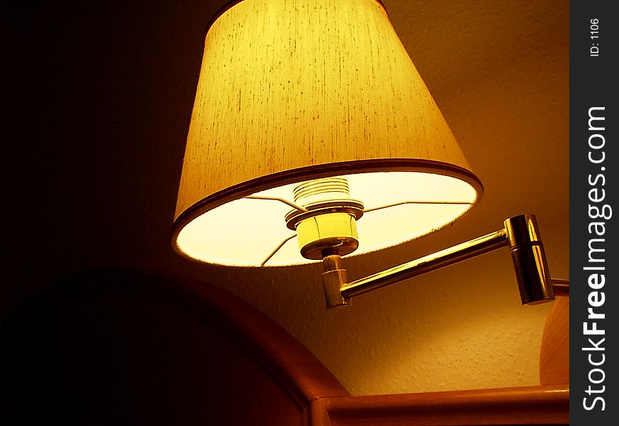 Lamp casting yellow light with soft shadows. Lamp casting yellow light with soft shadows