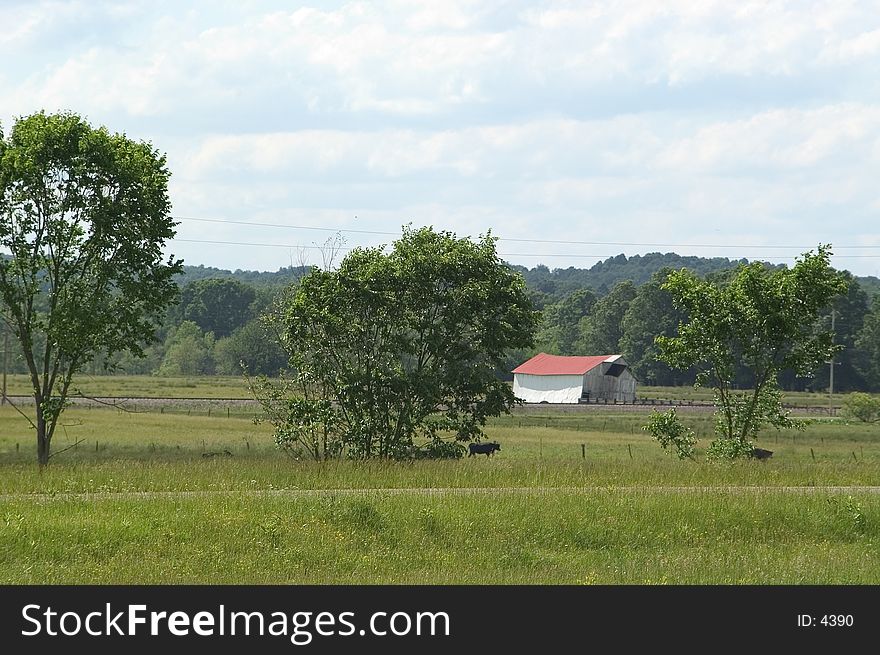 Scenic View of farm land in middle Ohio with old barn building