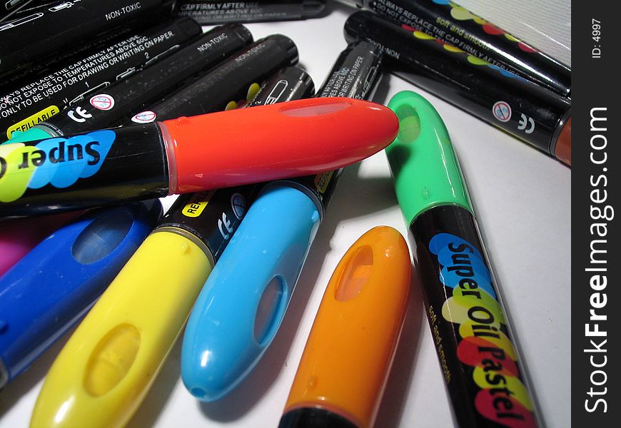 Pile of colourful pens of oilpastels. Pile of colourful pens of oilpastels