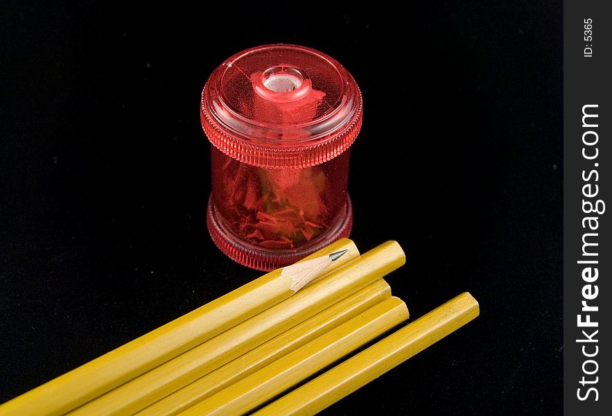 Photo of Pencil Sharpener and Pencils - Part of Series. Photo of Pencil Sharpener and Pencils - Part of Series