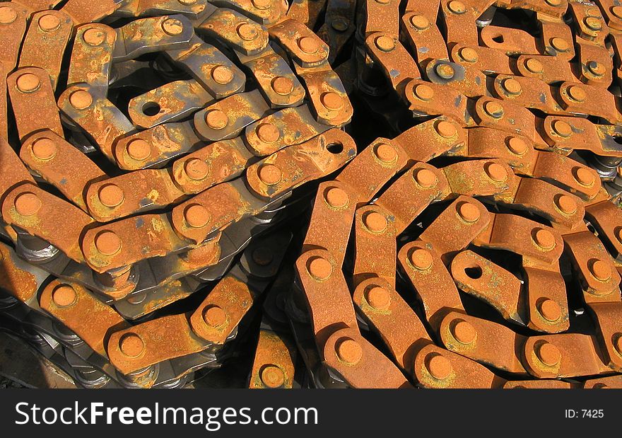 Big gears coiled up at an amusement park that was in the process of repairs. Big gears coiled up at an amusement park that was in the process of repairs.