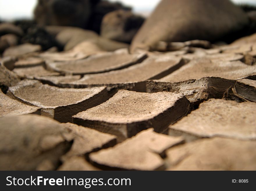 Dried mud on a beach. Dried mud on a beach