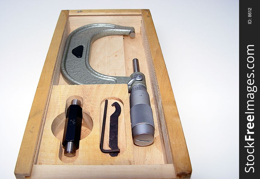 Machinist micrometer and calibrating tools in case. Machinist micrometer and calibrating tools in case