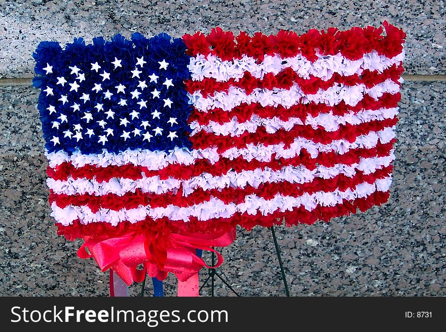 Photo of American flag made with flowers. Displayed at the WWII memorial in Washington D.C. Photo of American flag made with flowers. Displayed at the WWII memorial in Washington D.C.