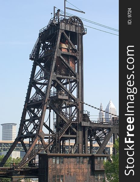 Counterbalance system of an old draw bridge in the Flats Industrial area of Cleveland, Ohio. This area is full of old fashioned draw bridges to allow the barges on the lake access to the loading and unloading areas that dot the Cuyahoga River. Counterbalance system of an old draw bridge in the Flats Industrial area of Cleveland, Ohio. This area is full of old fashioned draw bridges to allow the barges on the lake access to the loading and unloading areas that dot the Cuyahoga River