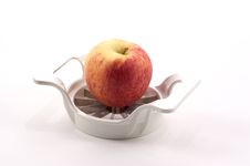 Apple And Apple Slicer Royalty Free Stock Images